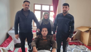 serkan-kaskana-akulu-tekerlekli-sandalye-yardimi-HMXguvAe.jpg