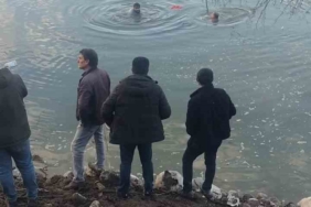 baraj-golune-ucan-otomobilin-surucusu-kurtarildi-mVcOaLE4.jpg