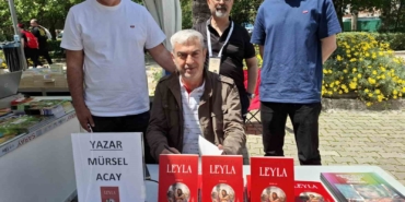 mursel-acay-izmir-kitap-fuarinda-okurlariyla-bulustu-3Mn89cN3.jpg
