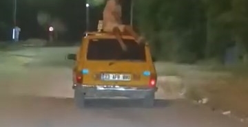 aracin-tavaninda-heyecan-dolu-ve-tehlikeli-yolculuk-E5trPZia.jpg